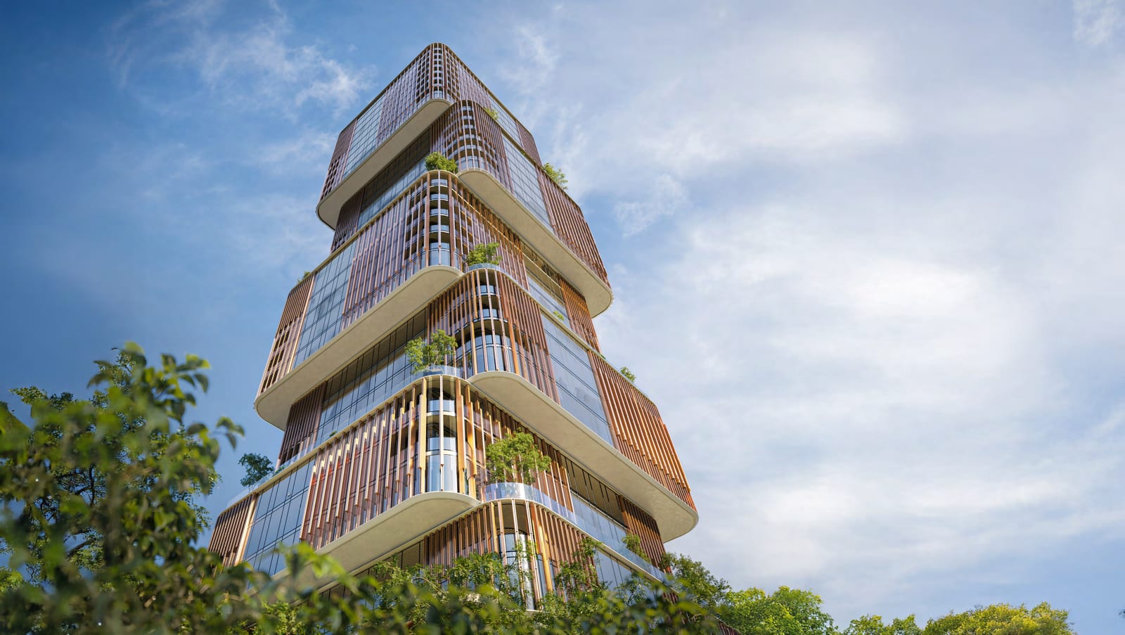 31 Above seen from below against a blue sky, its offset glass and bronze-finned volumes planted with trees