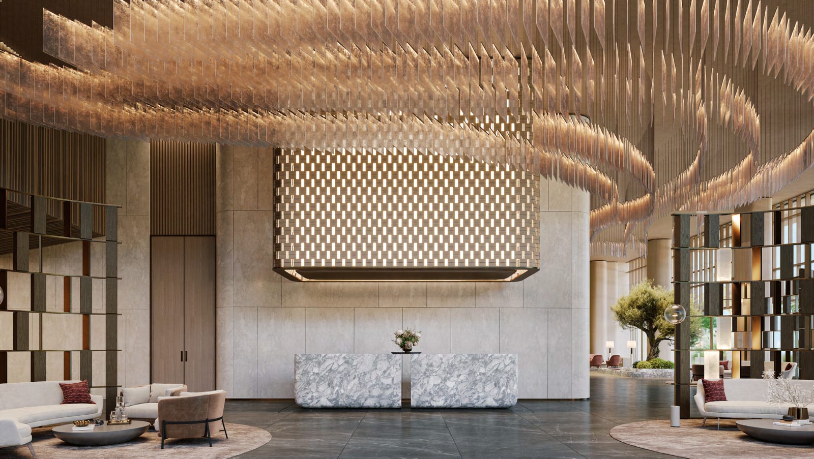 Main lobby with a marble reception desk, stone walls and a ceiling of suspended bronze-toned blades