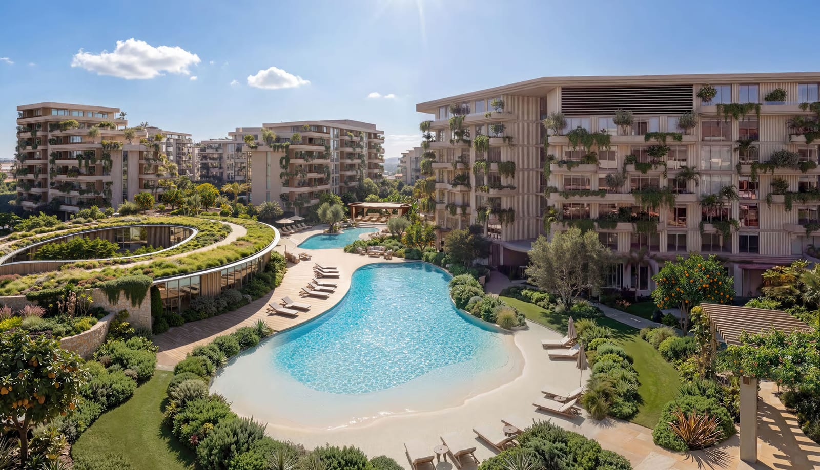 Lagoon pool with a sandy edge, lined by landscaped gardens and terraced apartment buildings