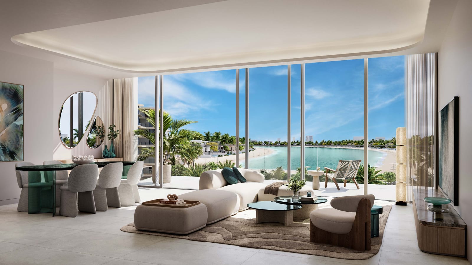 Three-bedroom apartment living and dining room with floor-to-ceiling glass facing the beach and lagoon