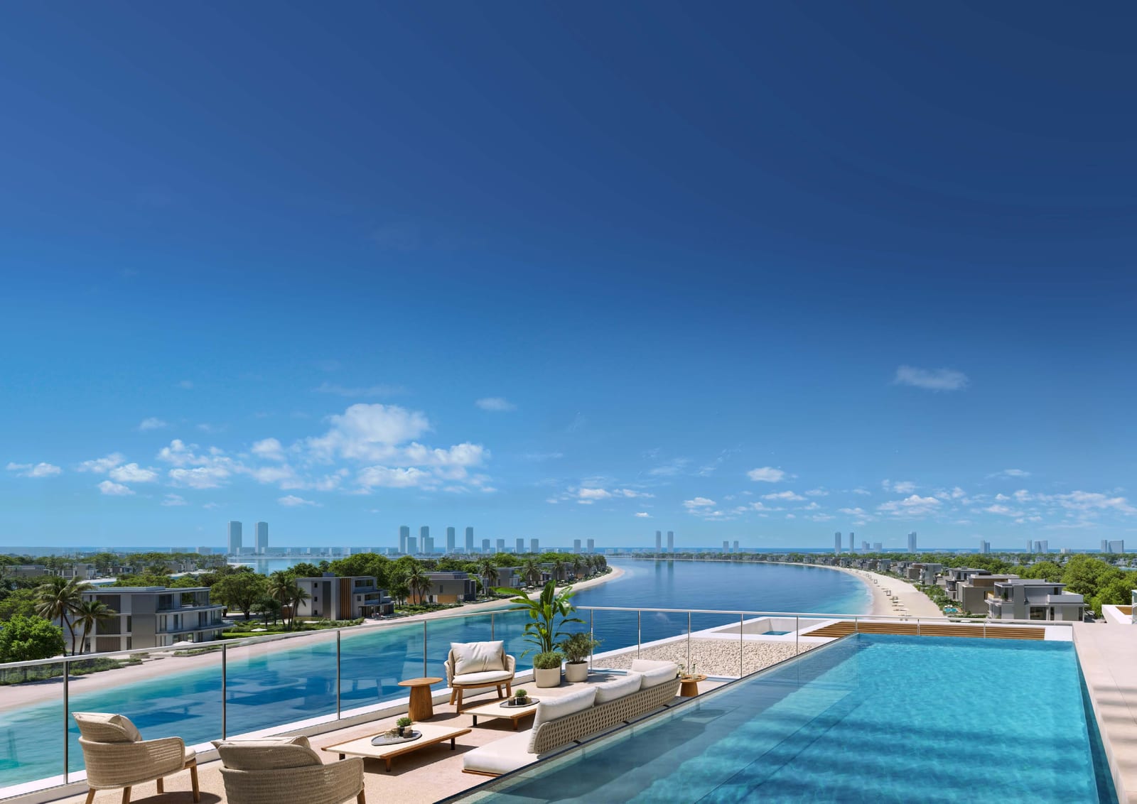 Penthouse terrace with outdoor sofas and a long private pool overlooking the coastline